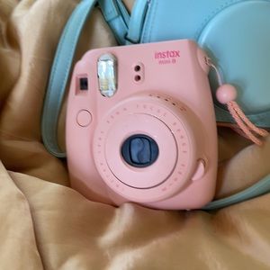 Instax Mini 8 pink camera with blue case
